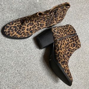 Tan and black heeled boots never worn